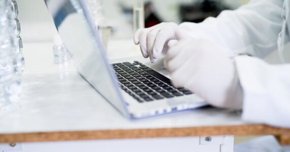 Laboratory research on the computer. Checking chemical parameters of the substance.